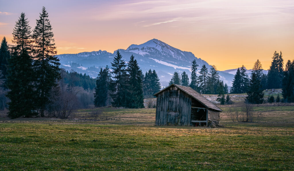 Barn at Rottachsee during sunset