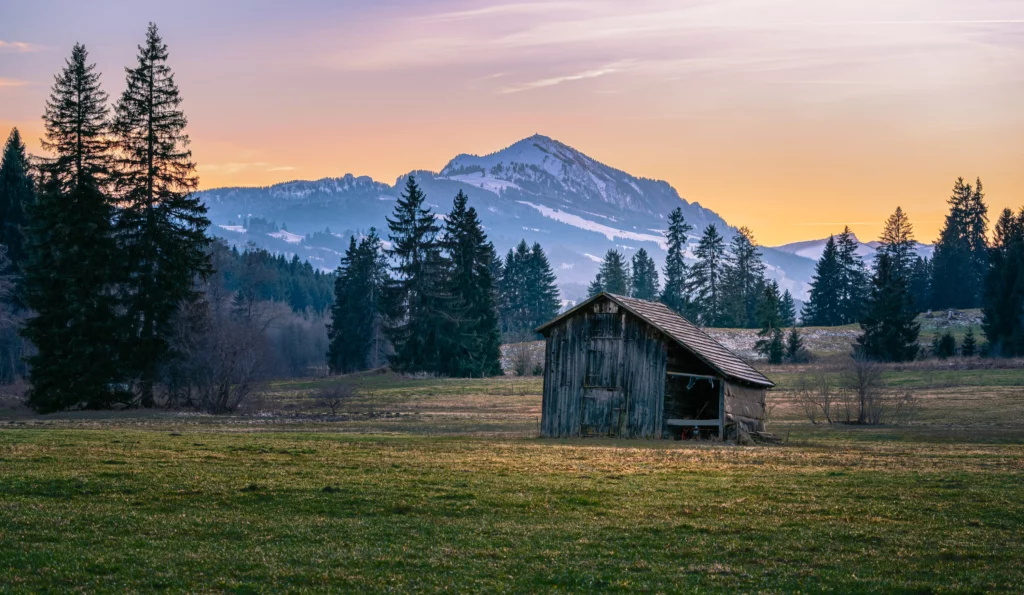 Barn at Rottachsee during sunset