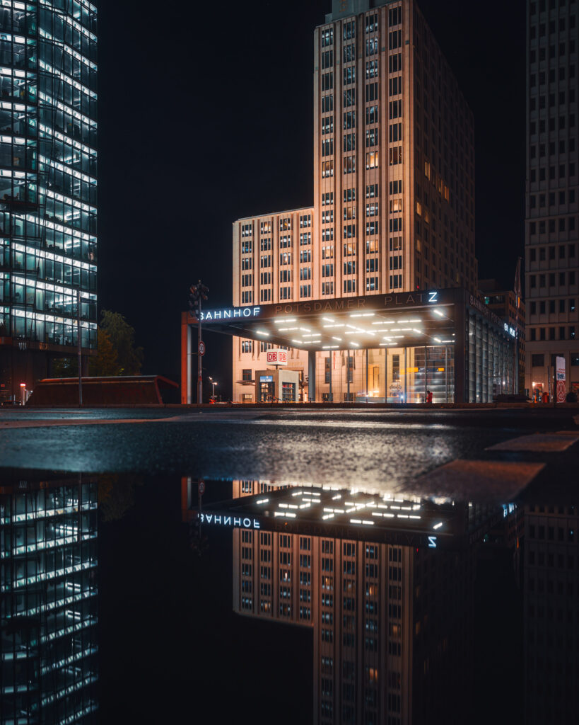 Potsdamer Platz station at night with strong light diffusion