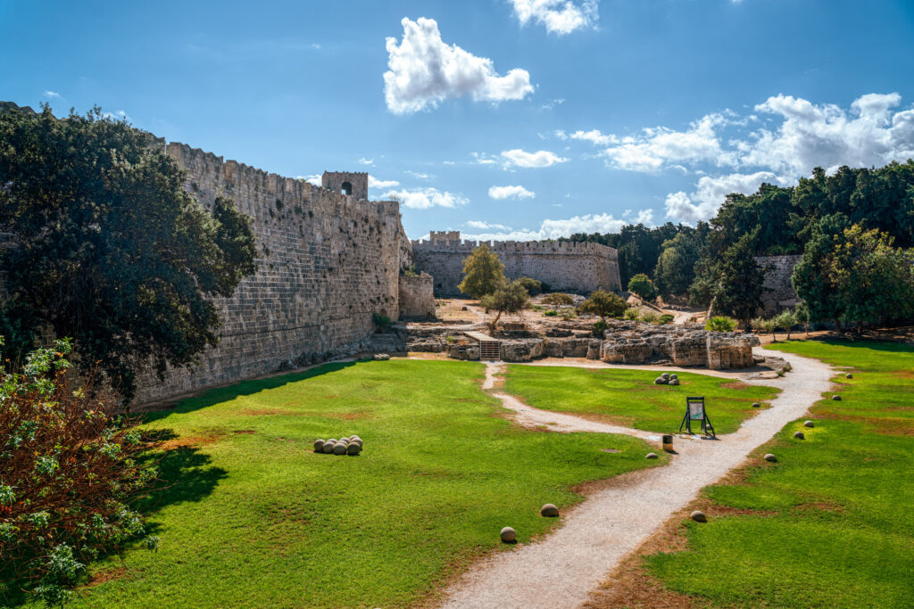 Forecourt with historical cannonballs at the city walls of Rhodes