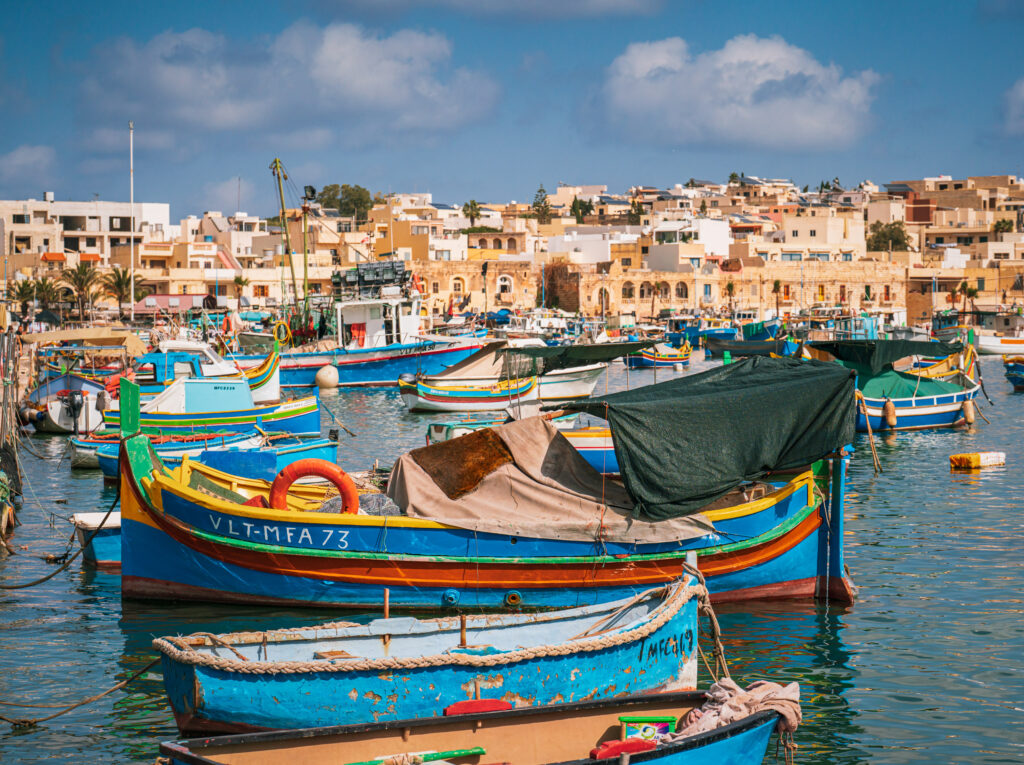 Colorful fisherboats at Marsaxlokk Harbour